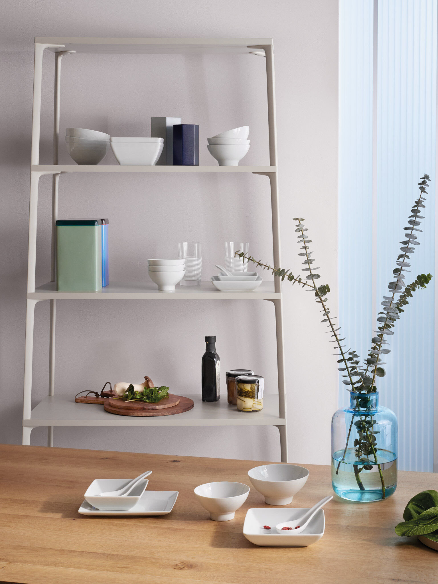 Thomas Loft White items arranged in a shelf